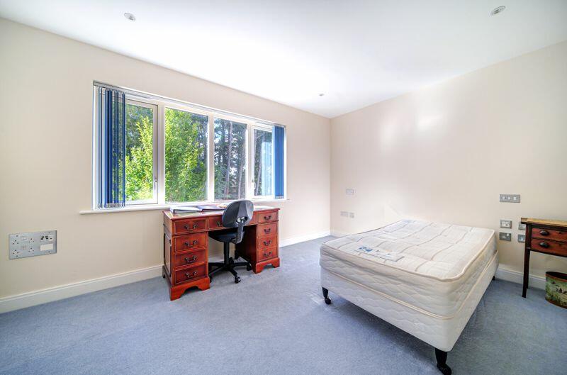 Double bedroom with West-facing window