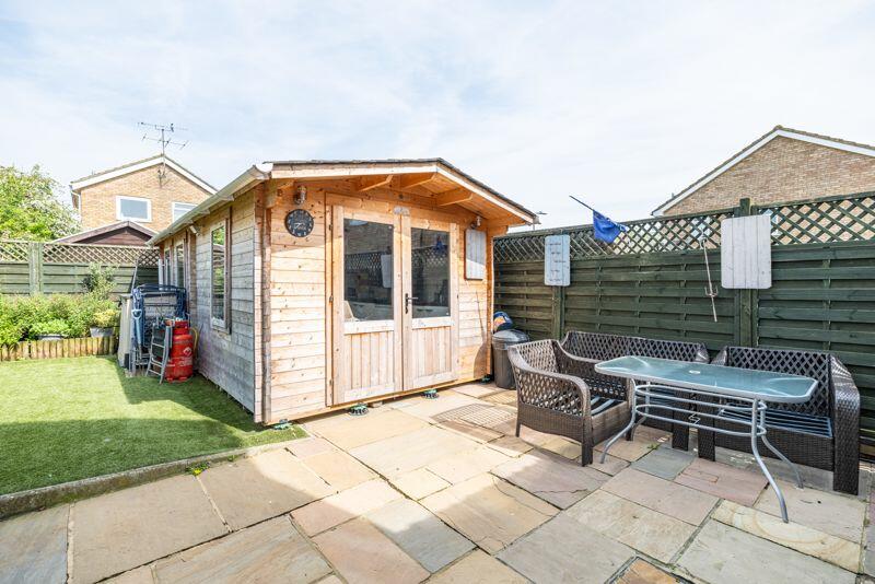 Rear garden with cabin