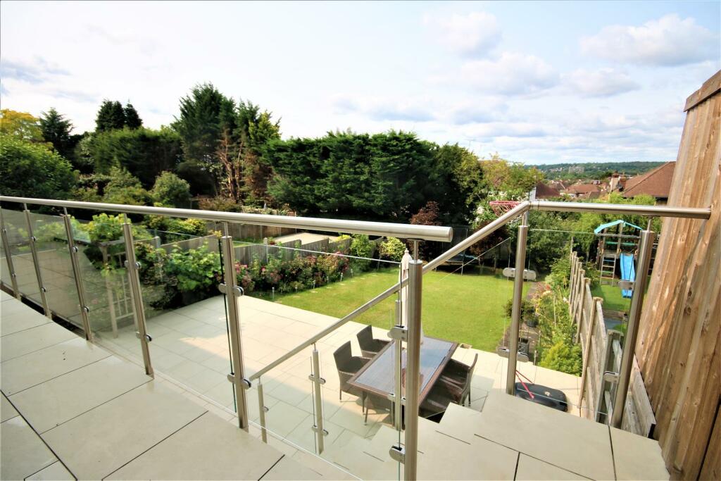 STEPS DOWN TO GARDEN LEVEL: