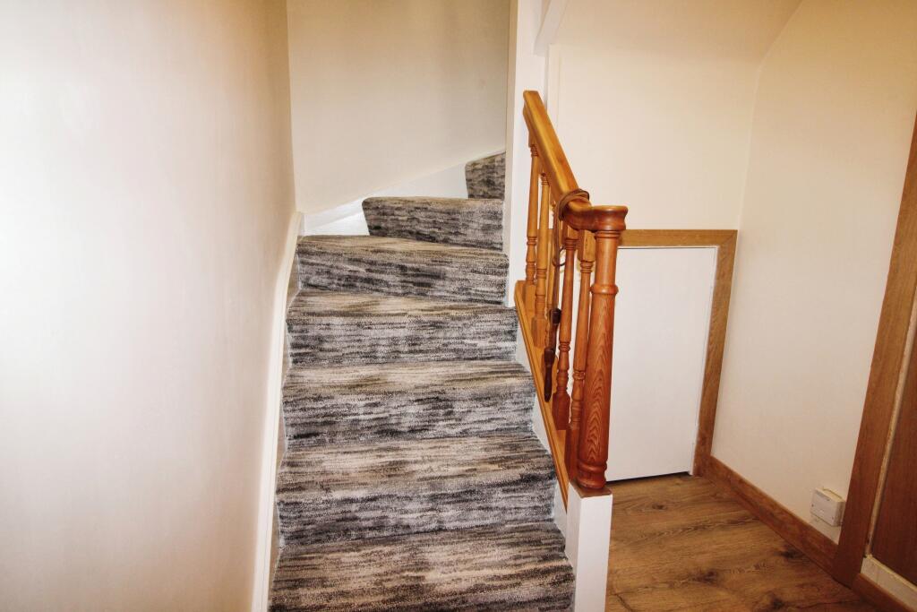 Under stairs storage.JPG
