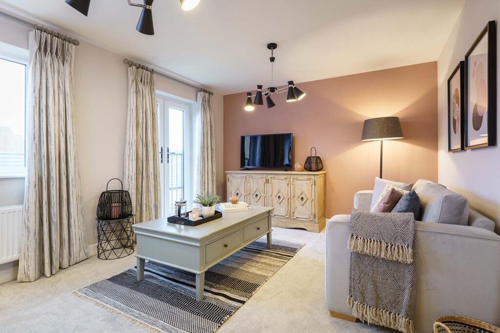 Additional living space on the first floor with a Juliet balcony