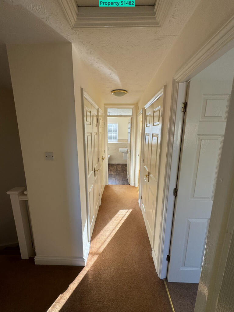 Landing area showing cupboard space