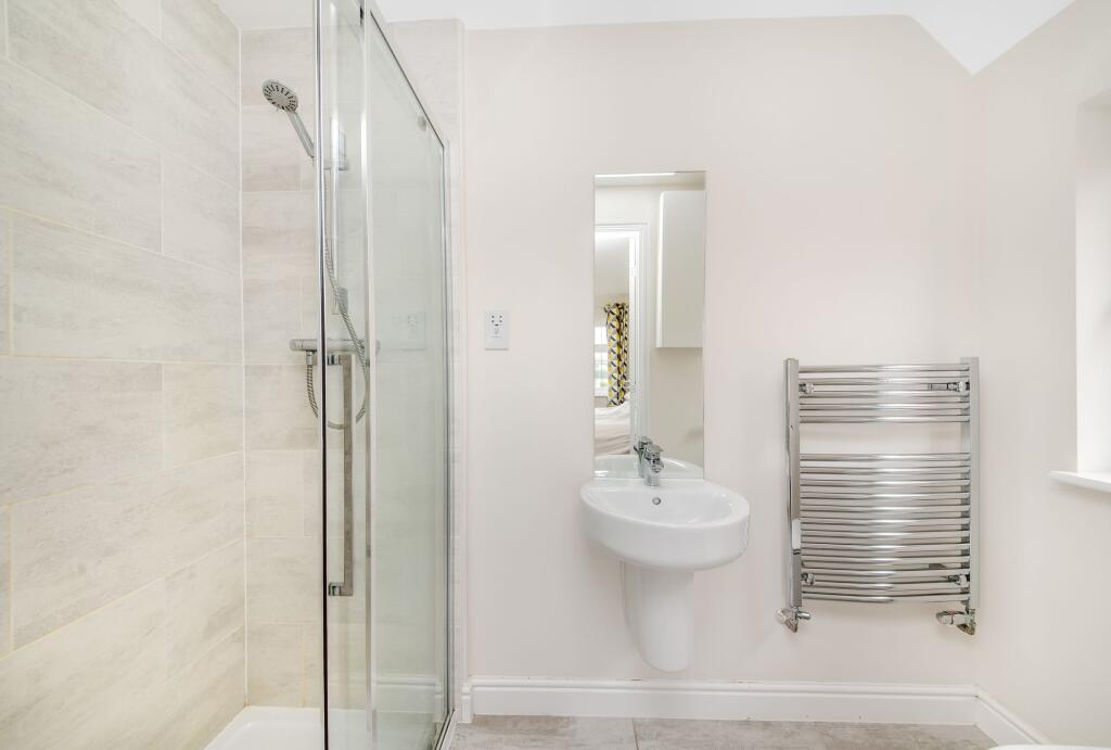 BEDROOM ONE EN-SUITE SHOWER ROOM