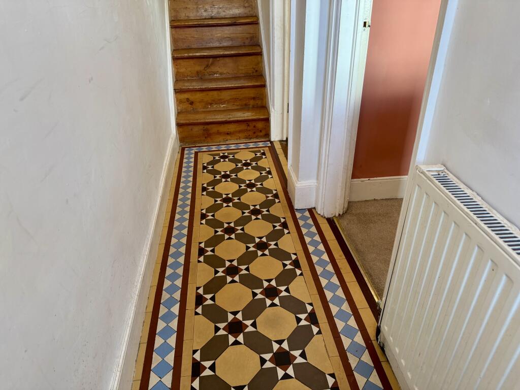hallway with original flooring