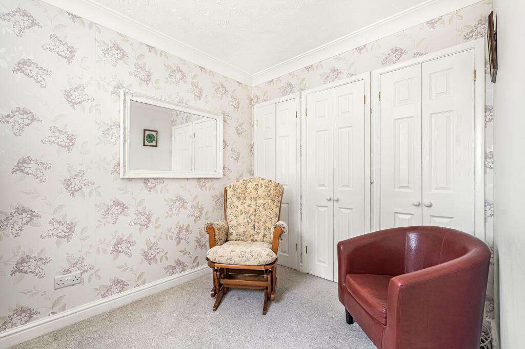 Bedroom with fitted wardrobes