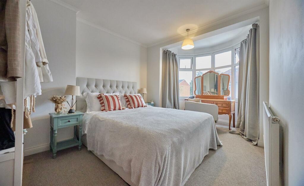 FRONT BEDROOM ONE