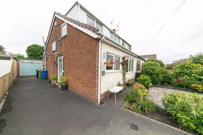 Front corner elevation &amp; driveway