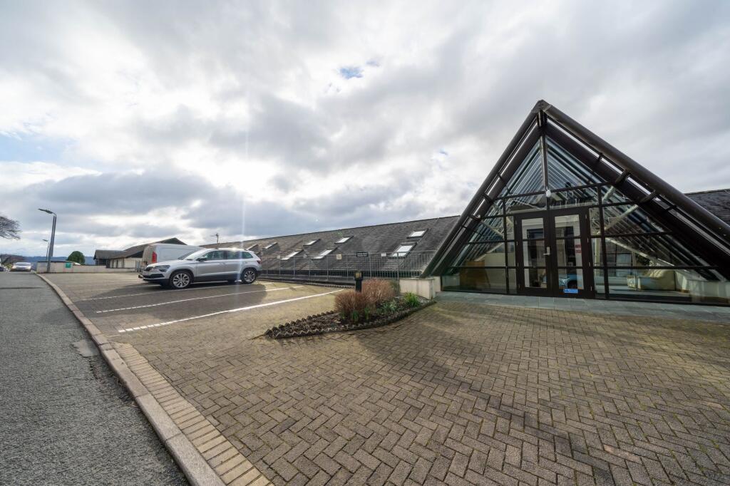 Rear Exterior/Atrium and car park