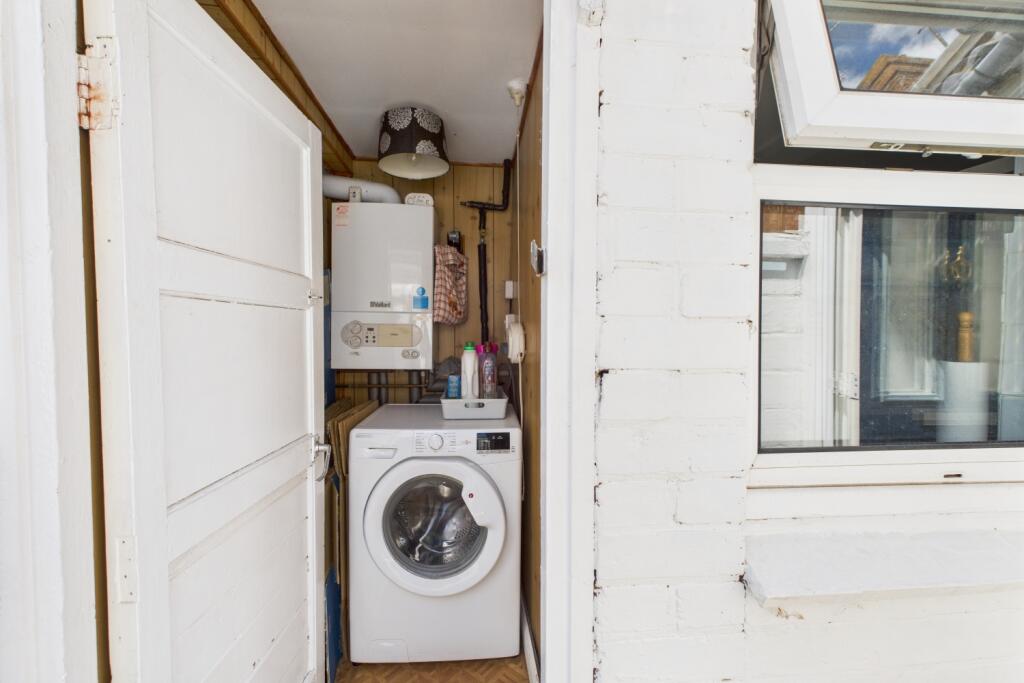 Outside space with boiler and washing machine