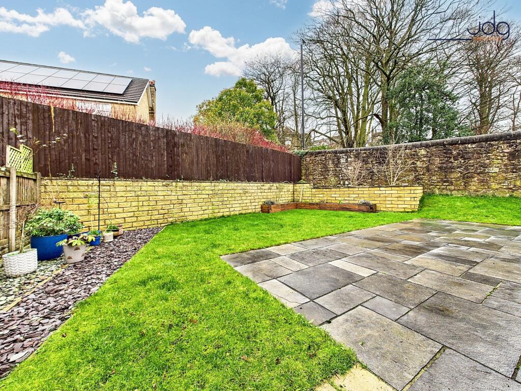 Spacious West-Facing Garden with Lawn and Seating Areas