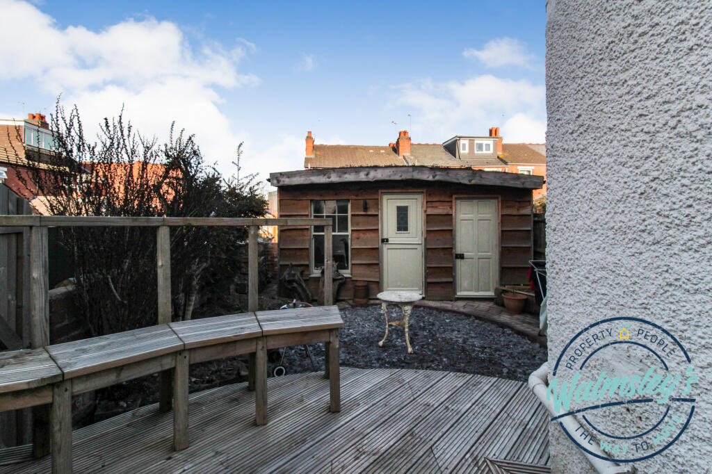 Rear garden and cabin