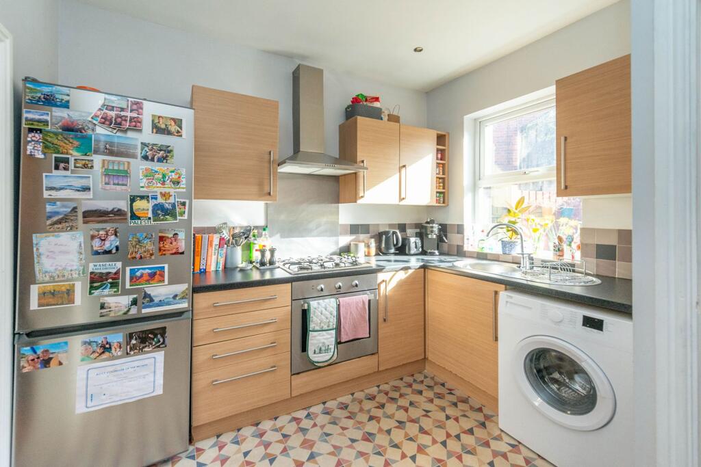 SITTING ROOM AND DINING KITCHEN