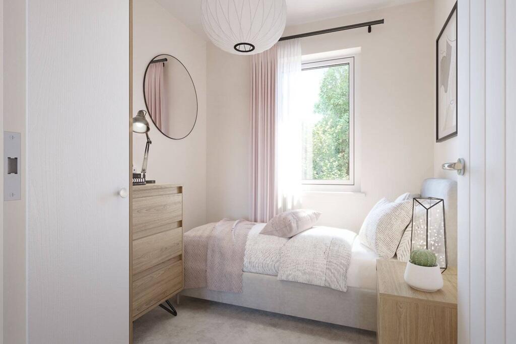 A compact bedroom with space for a single bed - ideal as a guest room, nursery, or home office