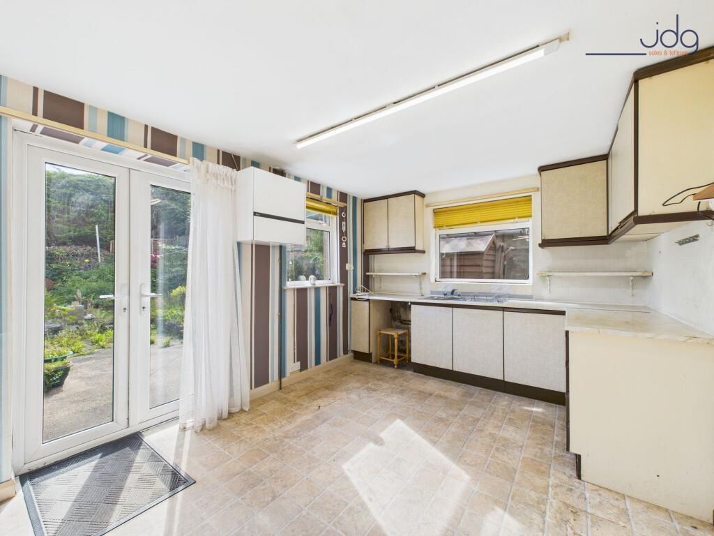 Kitchen with French Doors leading out to the Garden
