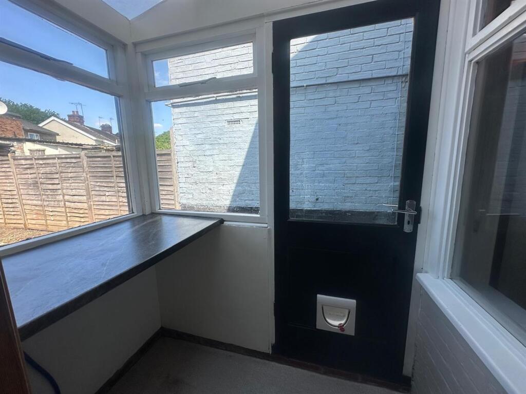 Rear Porch/ Utility Area