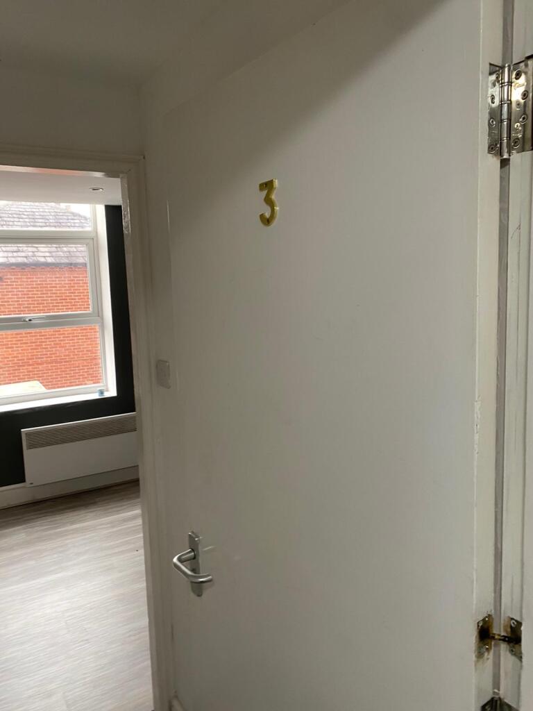 Bright and clean single toilet room with fresh ...