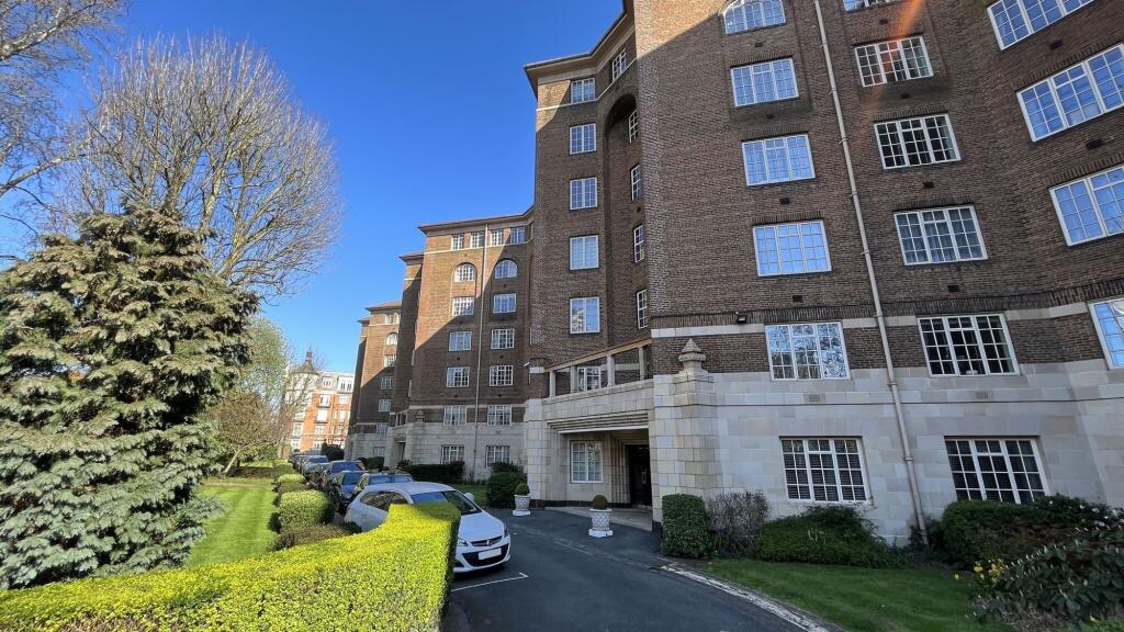 Well-maintained and attractive front of a large...