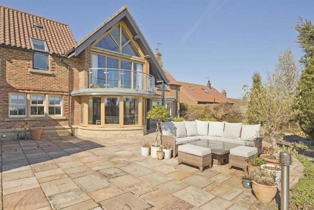 Patio to rear of House