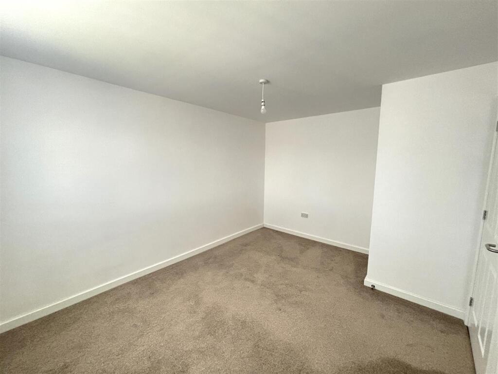 bedroom 2 a.jpg
