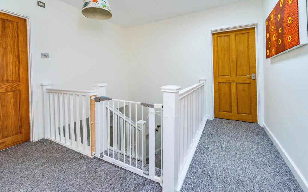 CLOAK ROOM HALLWAY AND LANDING