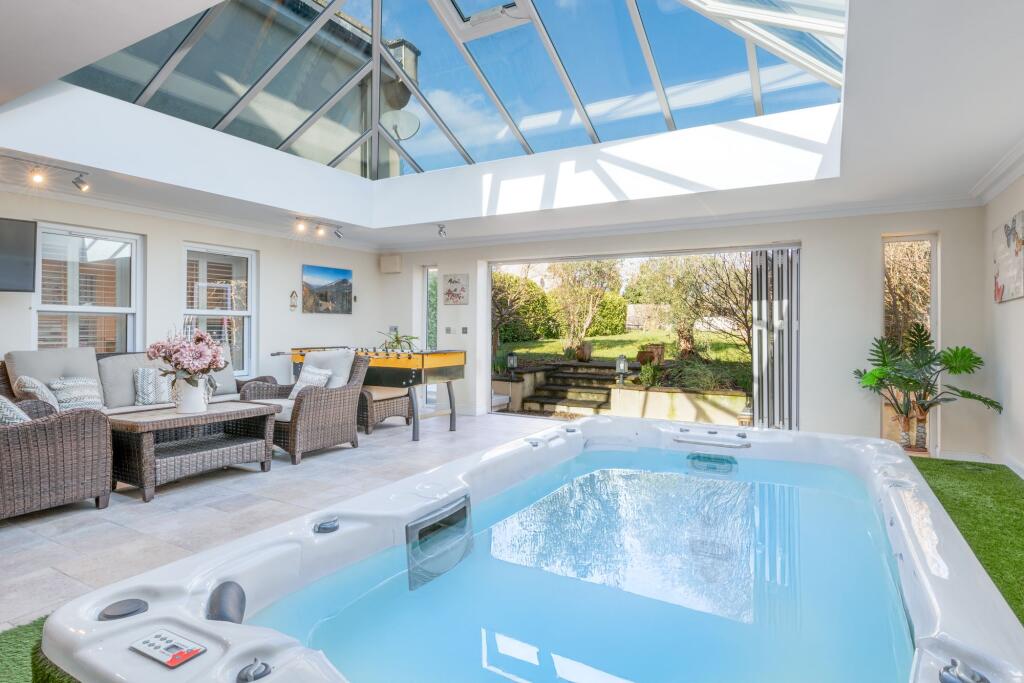 Garden room with resistance training pool