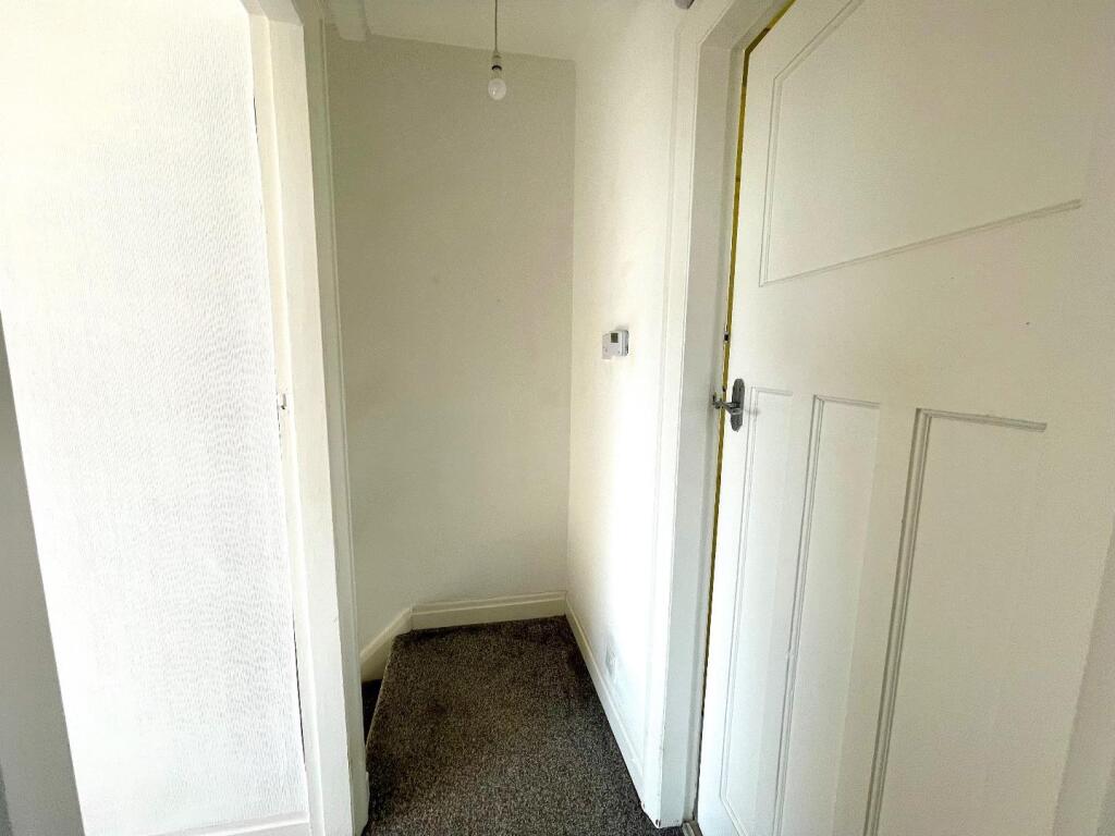 TO THE FIRST FLOOR LANDING
