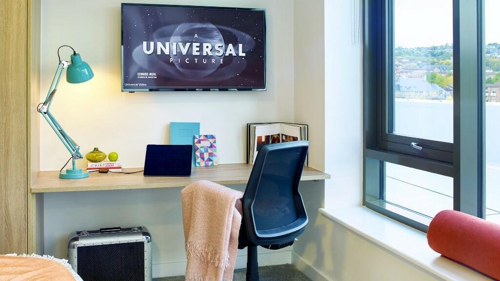 A bright and contemporary living space featurin...