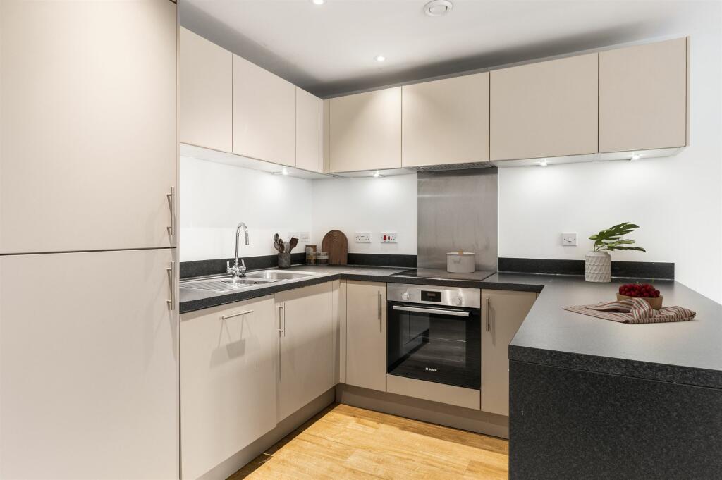 Experience the elegance of modern living with this beautifully designed kitchen.