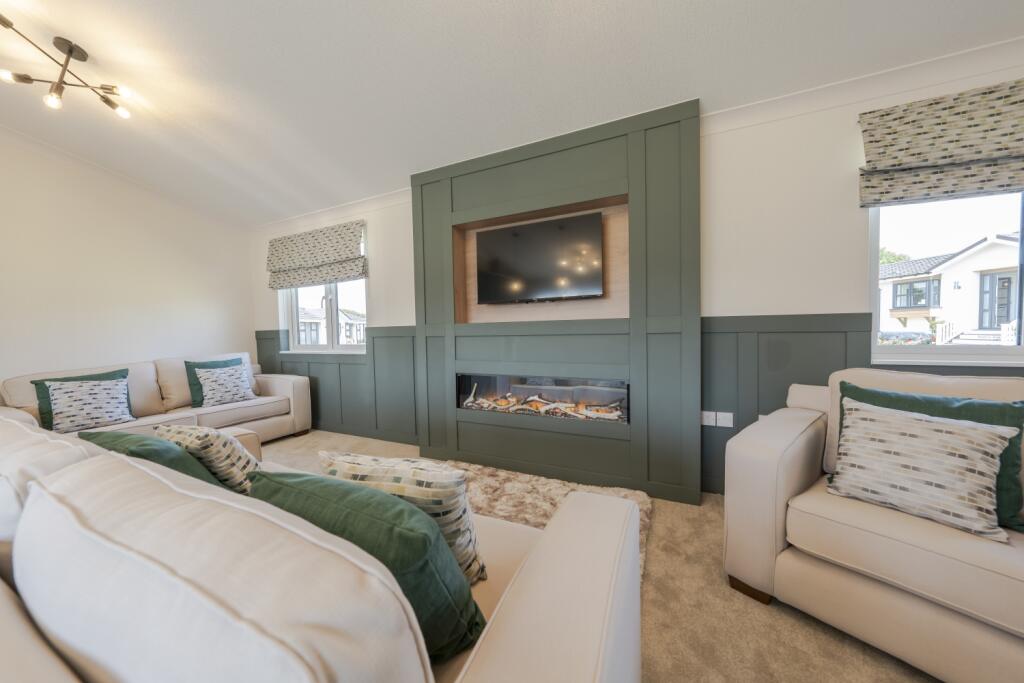 LIVING ROOM WITH MEDIA WALL