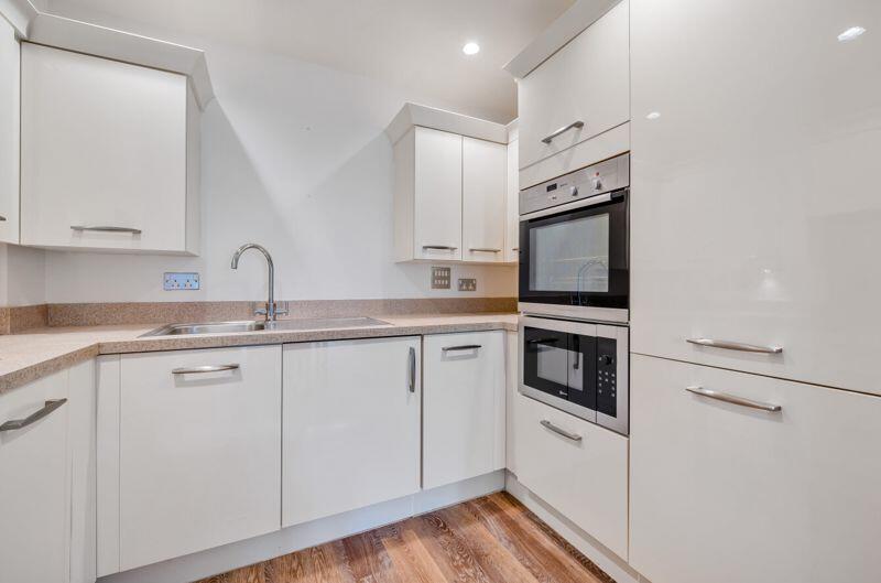 Kitchen with built-in appliances