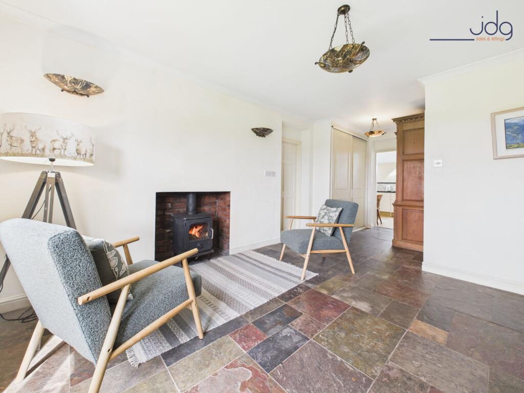 The snug with wood burning stove