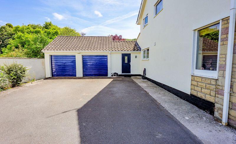 Plenty of parking and double garage, ...