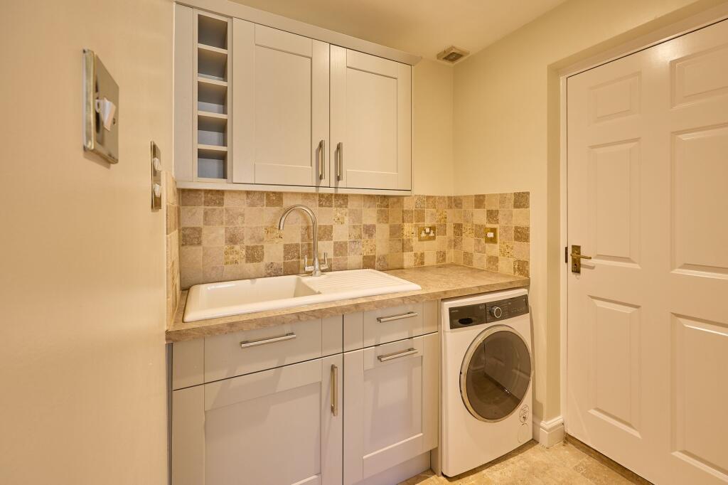 Utility plus door to garage