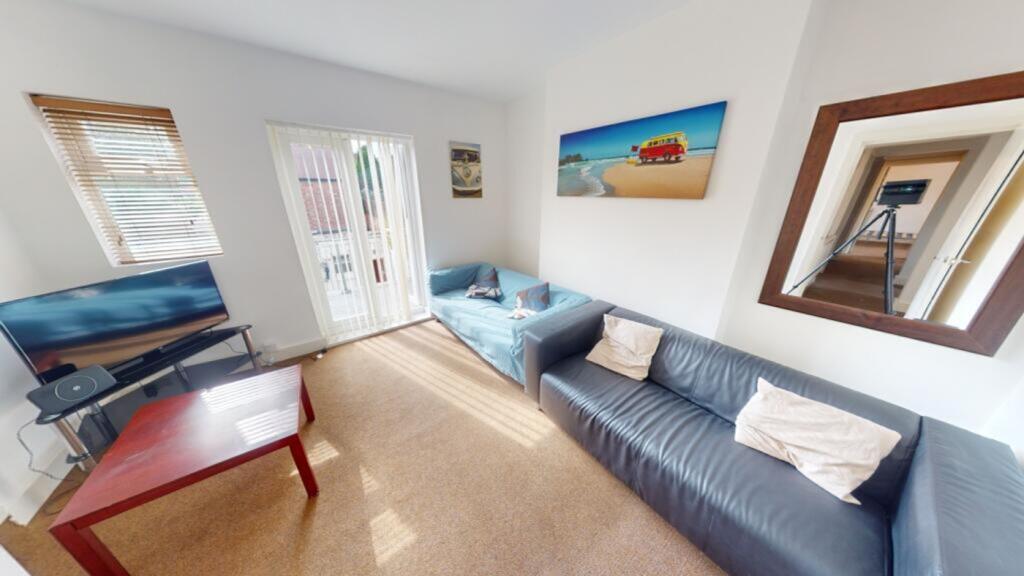 A spacious and inviting large modern living roo...