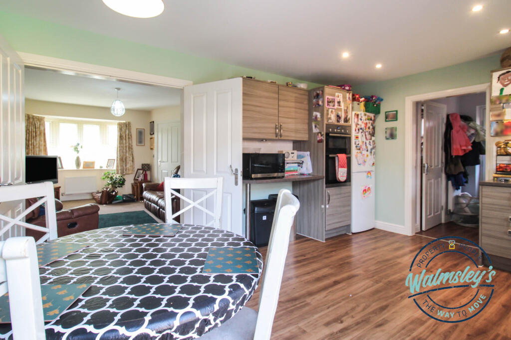 Kitchen through to sitting room