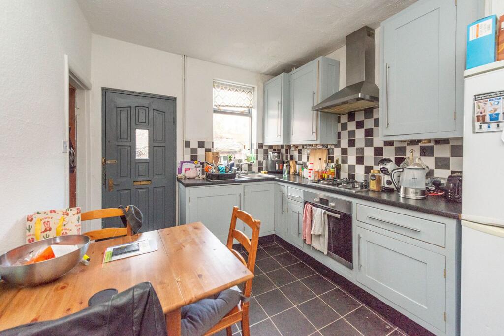 SITTING ROOM AND DINING KITCHEN