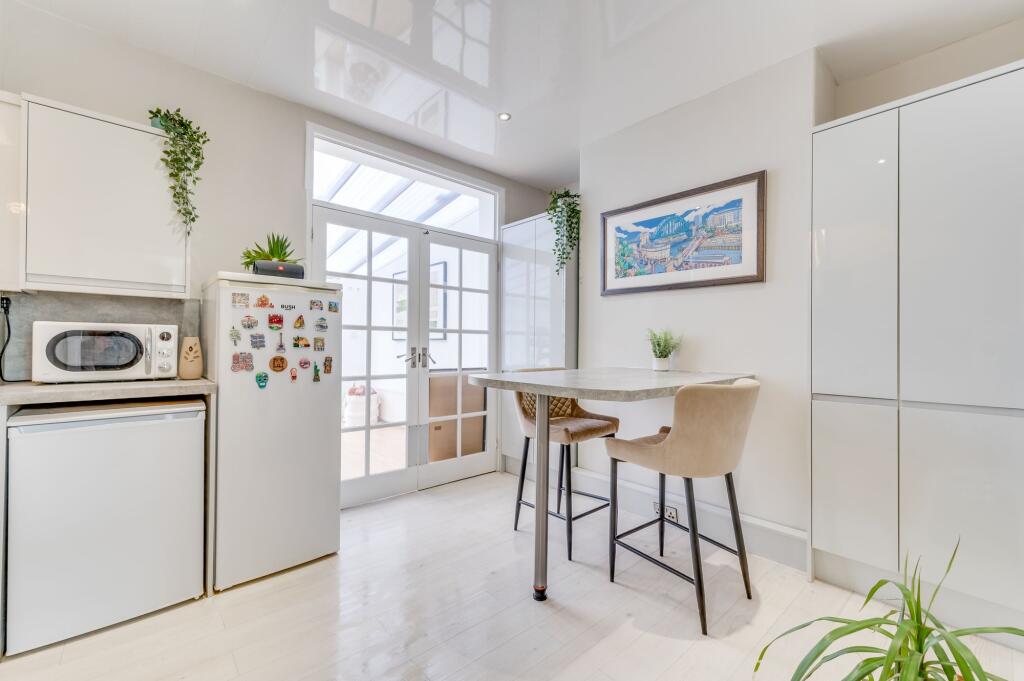 SITTING ROOM DINING KITCHEN AND CONSERVATORY