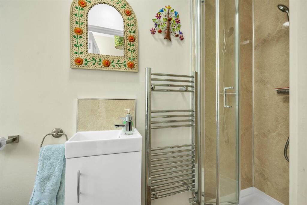 DOWNSTAIRS W/C AND SHOWER ROOM