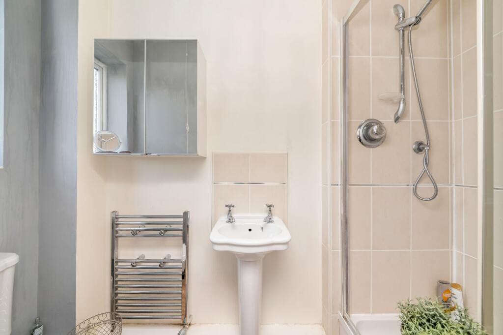 BEDROOM ONE EN-SUITE SHOWER ROOM