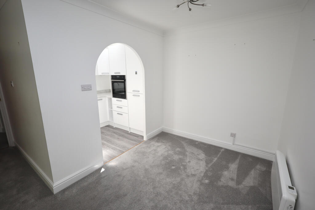Dining area through to kitchen