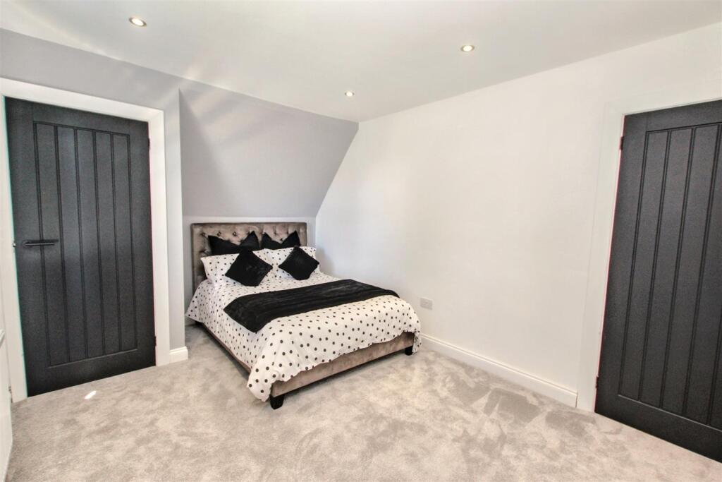 11- Bedroom Two.jpg