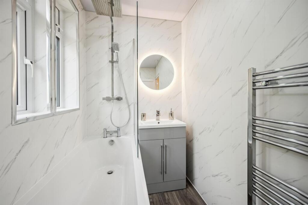 Bathroom - bath, shower and vanity unit.jpg