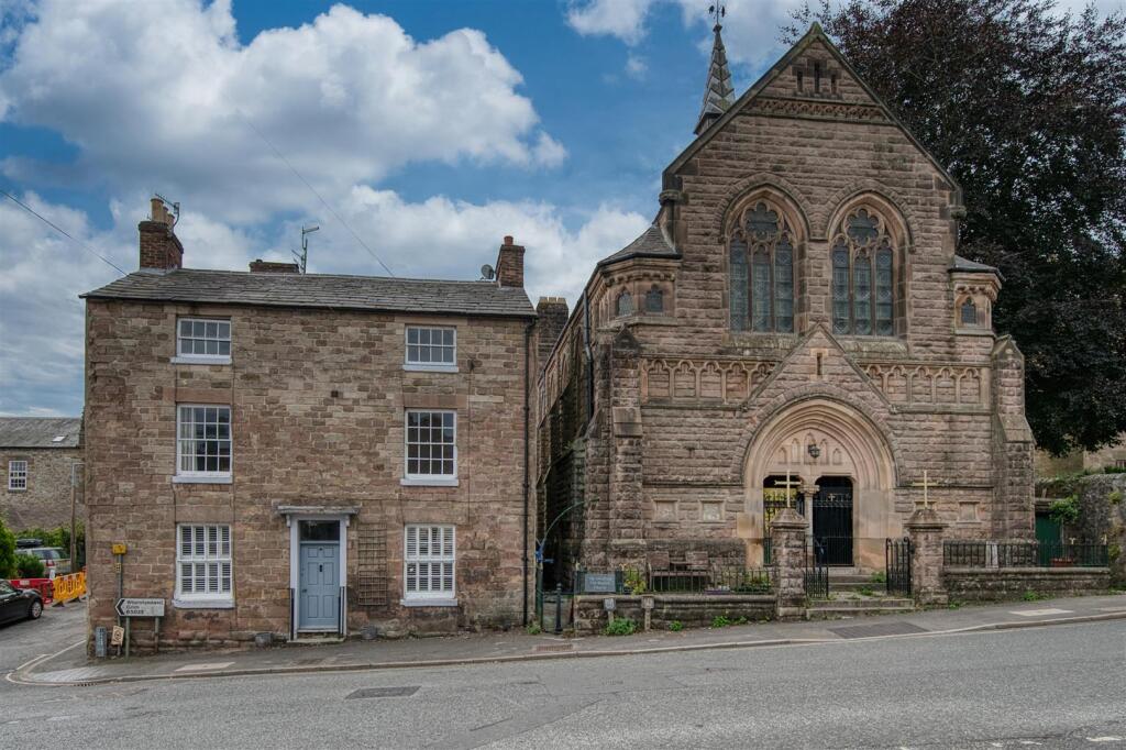 Front of the home and church.jpg