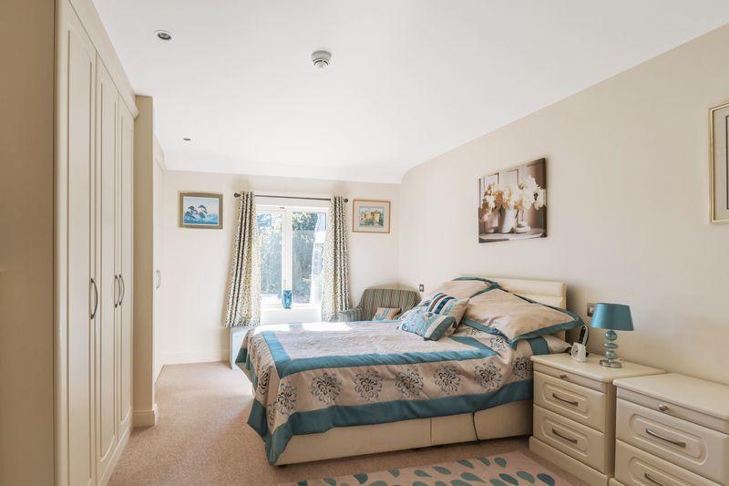 Bedroom with fitted wardrobes