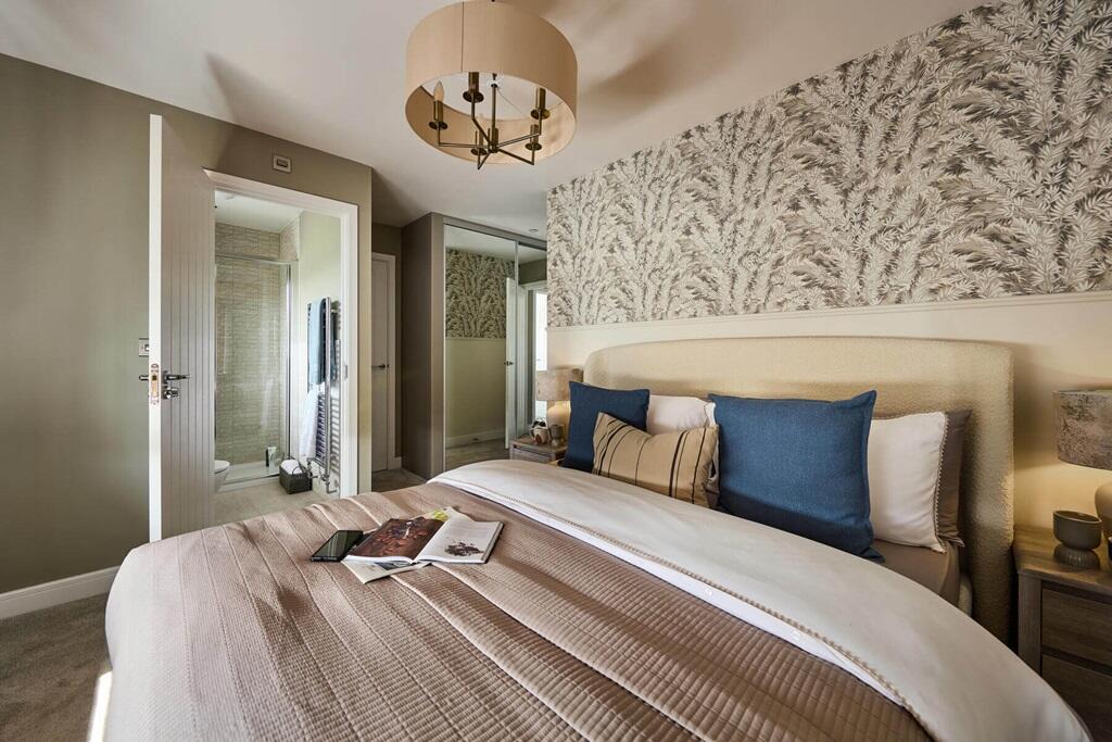 The main bedroom also features an private en suite and storage cupboard
