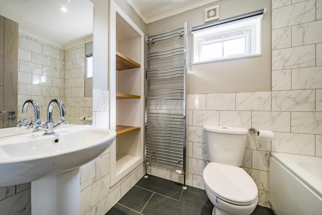 BATHROOM with SHOWER over bath.jpg