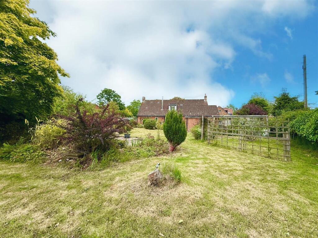 rear aspect and garden