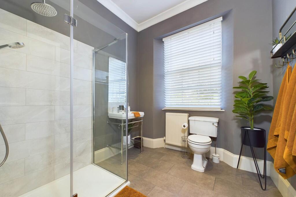 Shower room serving the third bedroom