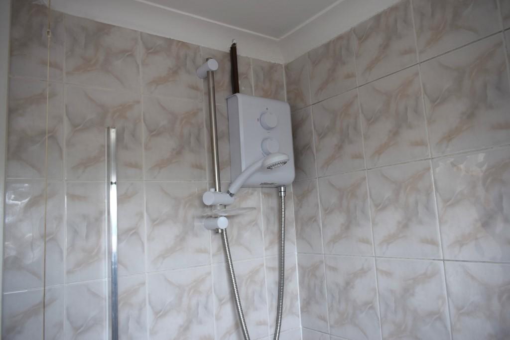 Shower over bath