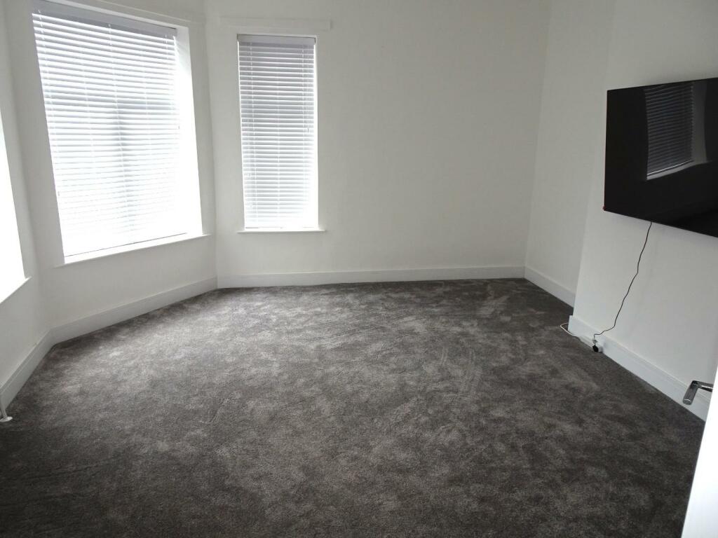 Lounge with large flat screen TV.JPG